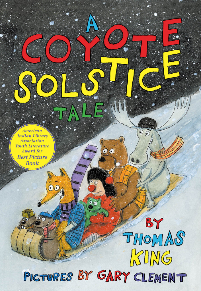  Cover: A Coyote Solstice Tale by Thomas King. Illustrated by Gary Clement. It is nighttime and snowing. A beaver, an otter, a coyote, a girl with light skin tone and short black hair, a brown bear and a grey moose ride together down a snowy hill on a wooden toboggan. They wear winter scarves, jackets and hats. 