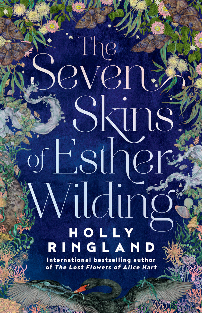 Cover: The Seven Skins of Esther Wilding by Holly Ringland, international bestselling author of The Lost Flowers of Alice Hart. An illustrated border of light pink and yellow flowers with thin green leaves, brown moths with blue markings, conical seashells, ribbons of water, seaweed, and light peach and pink sea anemone surrounds a background of dark blue night sky with stars. At the bottom of the border is a dark bird with a long curved neck, outstretched wings, and an orange beak. 