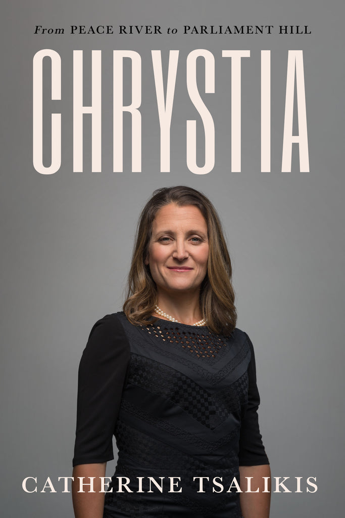  Upper body photograph of Chrystia Freeland standing in front of a grey background, facing the camera, with her arms by her side, smiling slightly. She has a light skin tone and dark blonde hair. She is wearing a black dress with a round neckline and three-quarter-length sleeves. A short double-string of pearls is just visible at the neckline. The title of the book, Chrystia: From Peace River to Parliament Hill is above the photograph and the author’s name, Catherine Tsalikis, is at the bottom of the cover. 