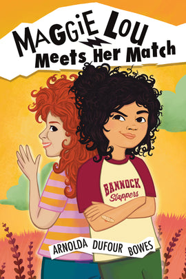  Cover: Maggie Lou Meets Her Match. By Arnolda Dufour Bowes. Two young girls stand back-to-back. One of them has medium skin tone and dark, curly hair pulled into a messy bun at the back of her head. Her T-shirt says BANNOCK SLAPPERS on the front. She has one eyebrow raised and is smirking while her arms are crossed in front of her chest. There's a band-aid on her arm. The other girl has light skin tone and her curly orange hair flows down her back. She waves while she smiles and looks over her shoulder. 