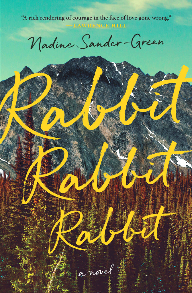  Cover: Rabbit Rabbit Rabbit, a novel by Nadine Sander-Green. The cover features a blue mountain range behind a coniferous forest in shades of green, yellow, and orange. Behind the mountain, a cloudy aqua-blue sky features the author’s name in black cursive writing. Over top of the forest and mountains, the title appears in yellow cursive writing. 