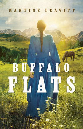  Buffalo Flats by Martine Leavitt. A woman with light skin stands in a grassy field with her back to us. Her brown hair is in a long braid down her back. She wears a long blue dress with long sleeves and lace at the collar. A horse grazes in the field. The sun shines from behind the rocky mountains in the background. 