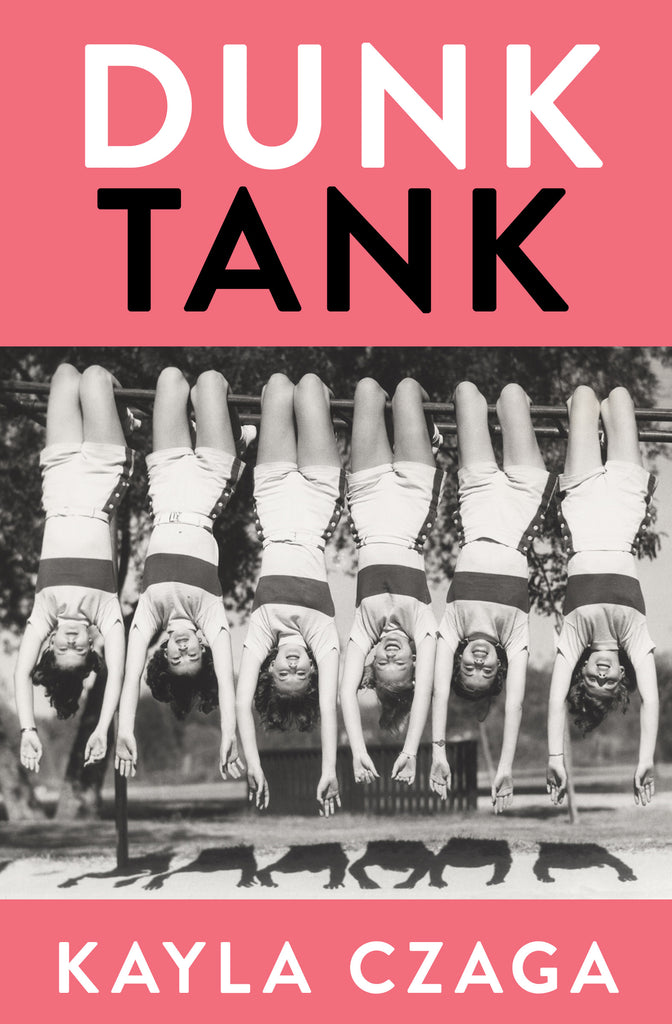  This image is in shades of black and white. Six women hang upside down by their knees from a set of monkey bars. They each wear the same uniform of white shorts with a dark stripe and buttons down the side and a white short-sleeved sweater with a thick dark stripe across the chest. Each woman dangles their arms toward the ground. They all have light skin tone and dark hair. Text: Dunk Tank. Kayla Czaga. 