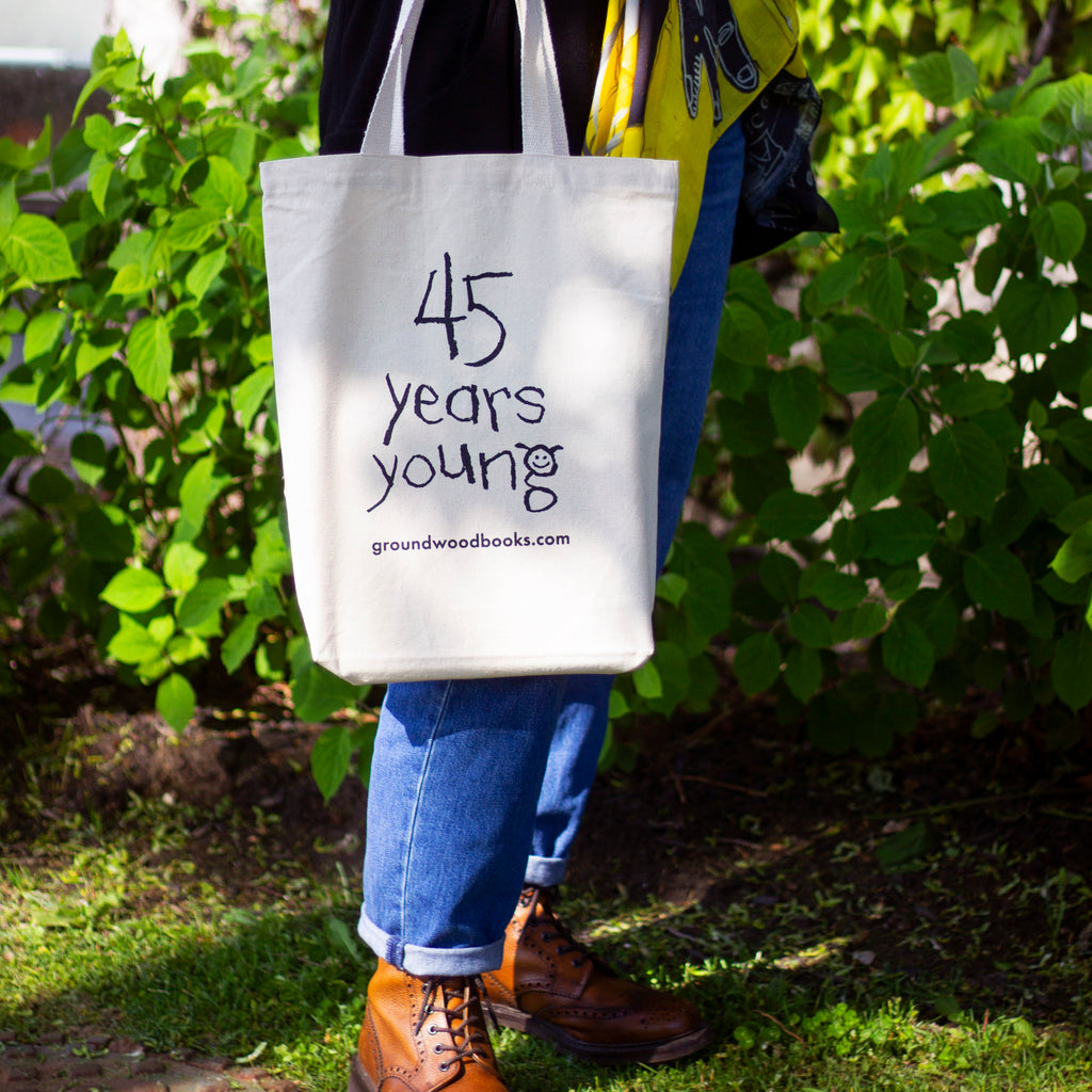  Photo: A white tote bag, with 