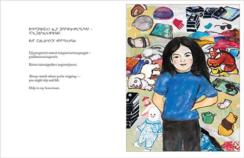  A girl with light skin tone and black hair stands with her hands on her hips. Behind her are toys, books, clothes, and VHS tapes strewn across the floor. Text: Always watch where you’re stepping — you might trop and fall. Only in my hometown. 